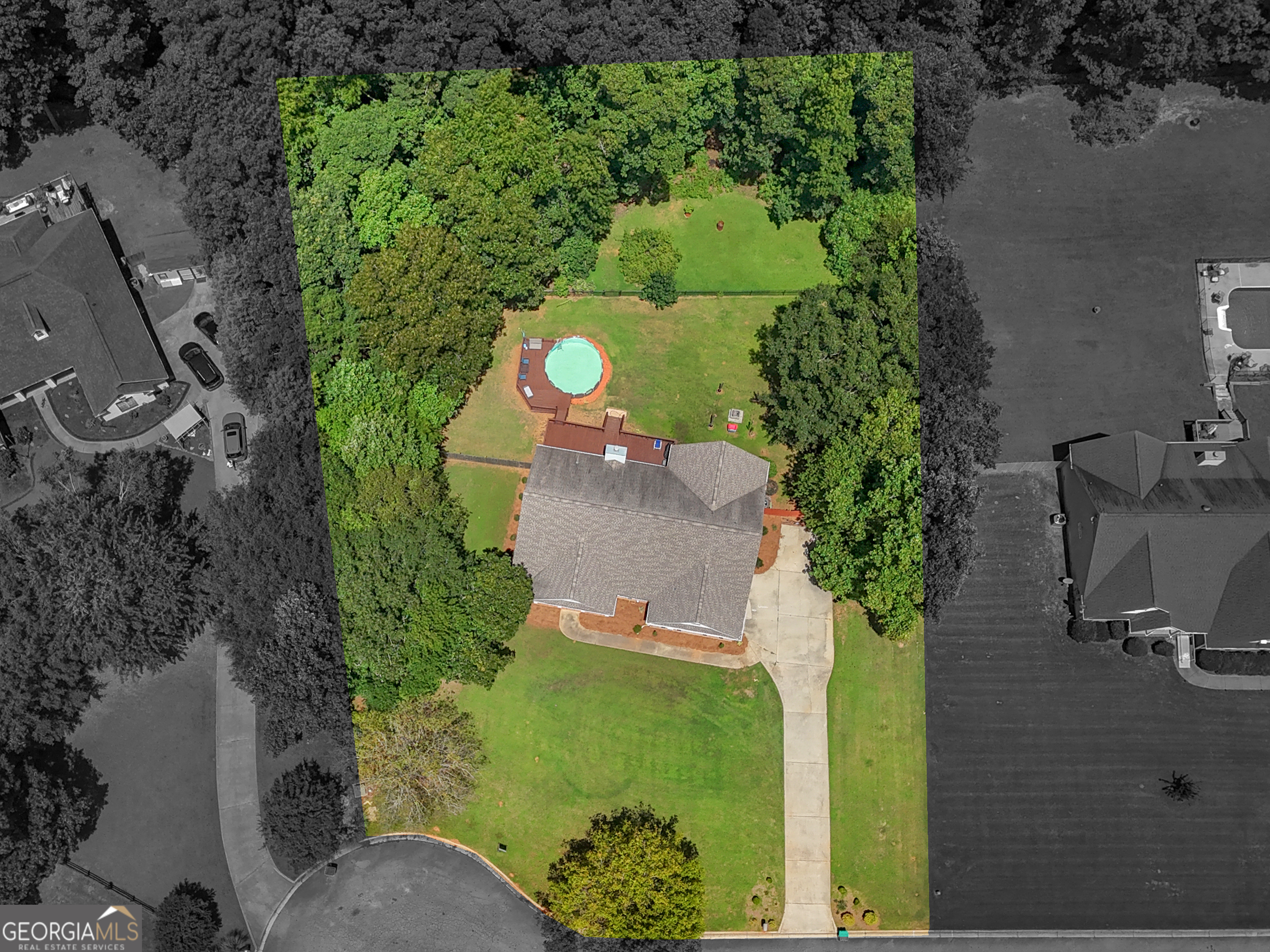 545 Barhams Ridge Drive McDonough, GA 30252 - Photo 54 of 55 an aerial view of a house with a yard