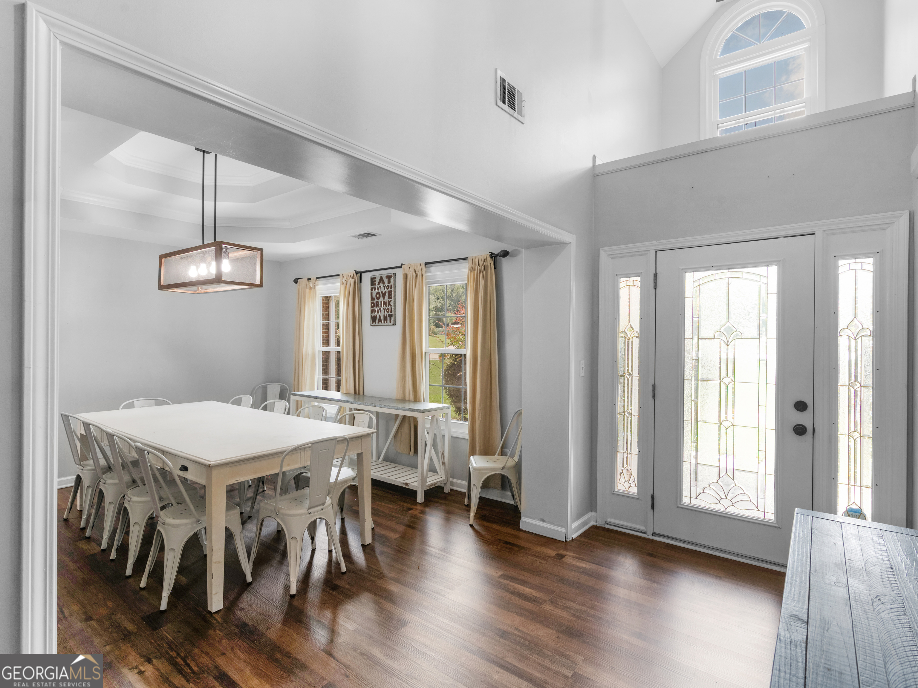 545 Barhams Ridge Drive McDonough, GA 30252 - Photo 6 of 55 a view of a dining room with furniture window and wooden floor