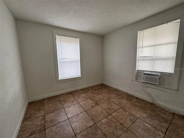 a view of a room that has a window in it