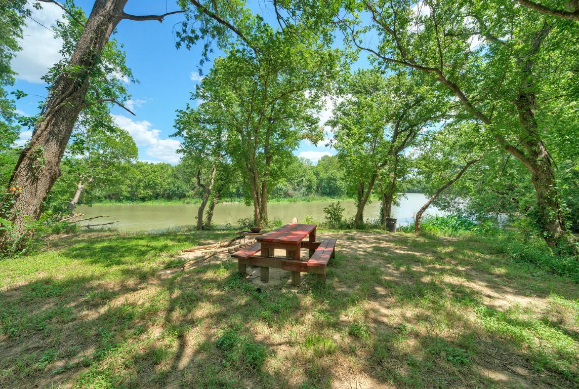906 Water Street Manor, TX 78653 - Photo 19 of 22 a view of a park with large trees