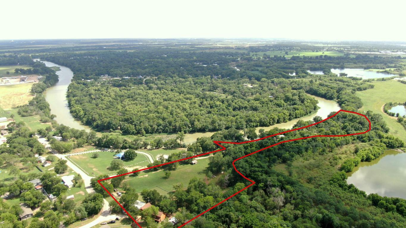 906 Water Street Manor, TX 78653 - Photo 22 of 22 an aerial view of a houses with a yard