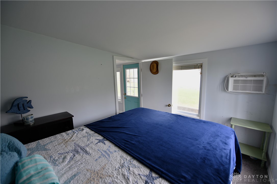 5445 Behm Road, Unit 15 Celina, OH 45822 - Photo 21 of 49 This cozy bedroom features bright walls and a window providing natural light.