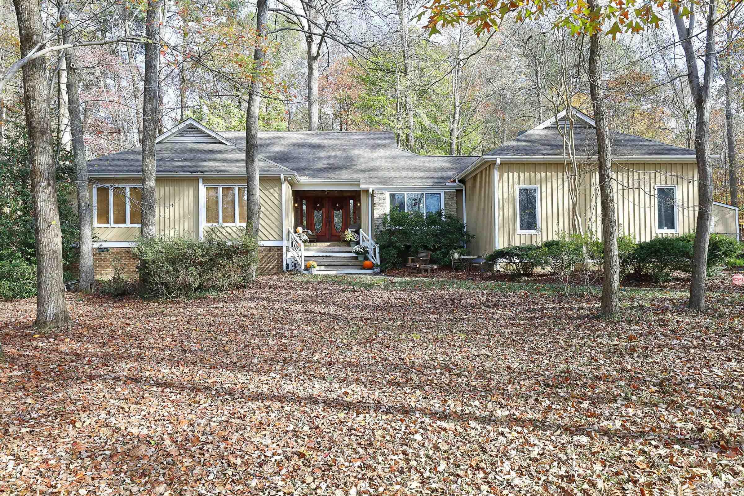 10904 Brass Kettle Road Raleigh, NC 27614 - Photo 1 of 41 a front view of house with yard and trees around