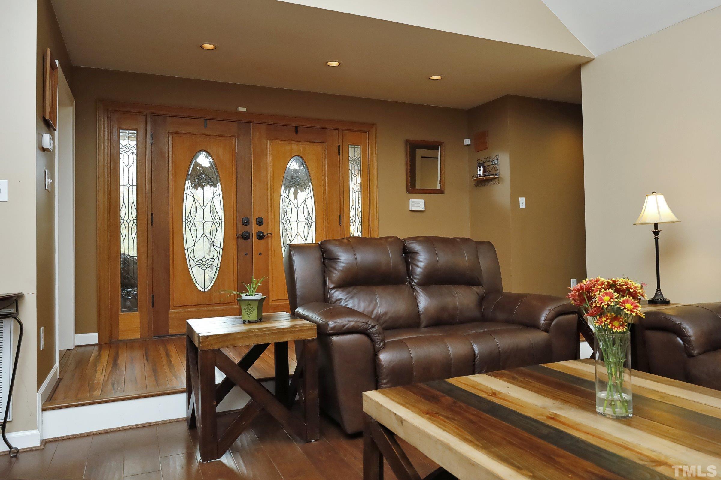 10904 Brass Kettle Road Raleigh, NC 27614 - Photo 11 of 41 a living room with furniture and a large window