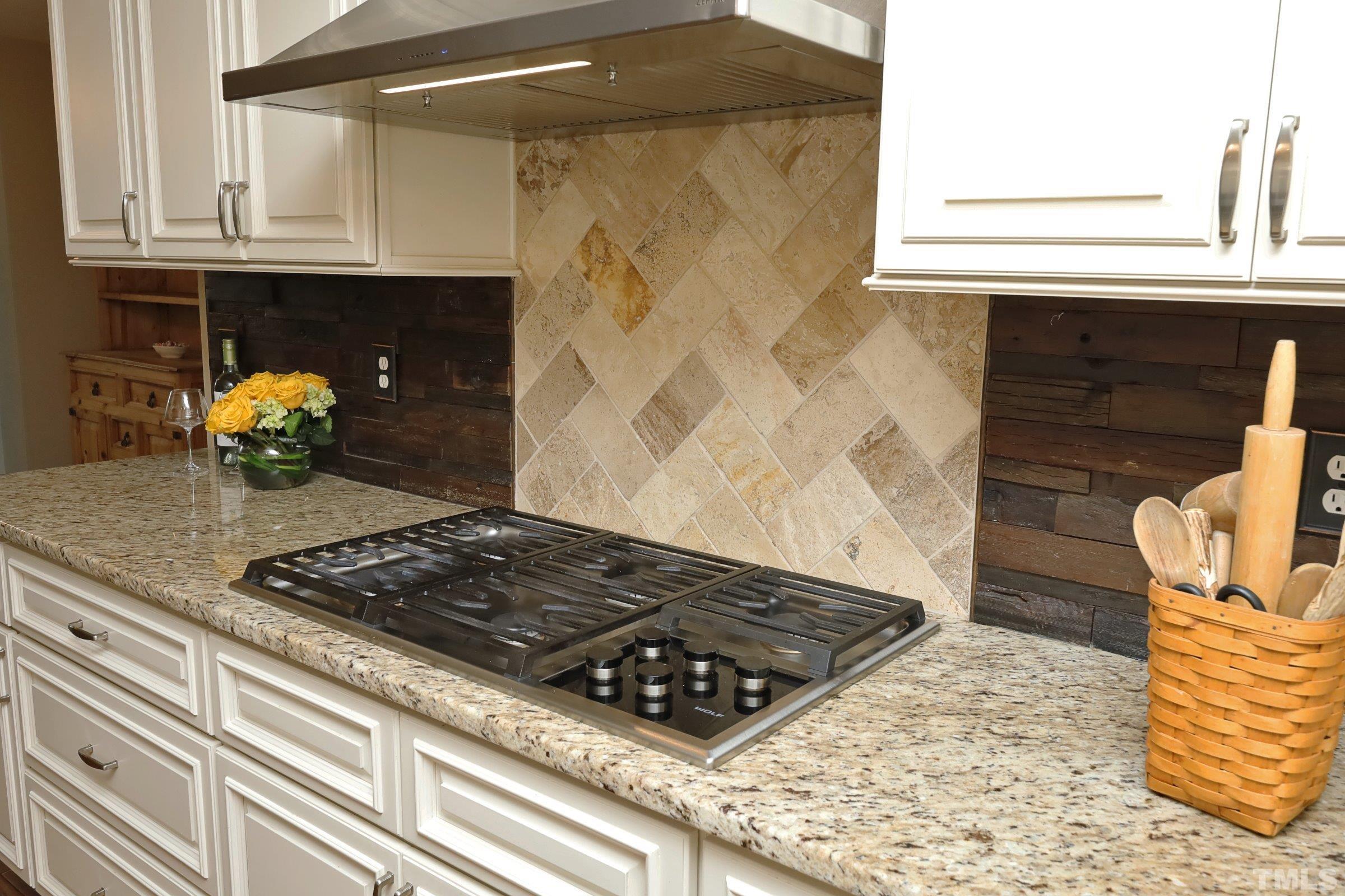 10904 Brass Kettle Road Raleigh, NC 27614 - Photo 21 of 41 a kitchen with a stove and a window