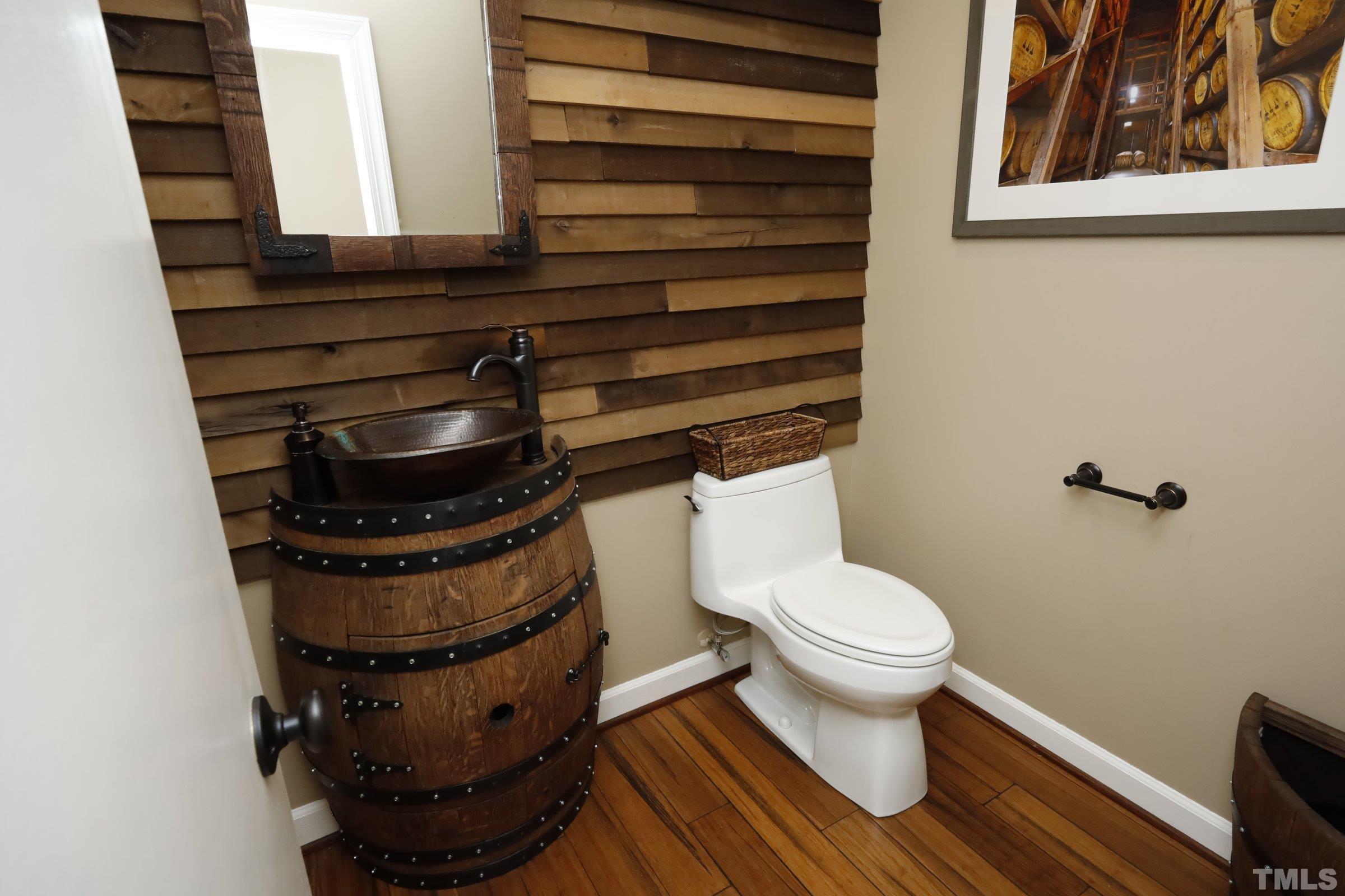 10904 Brass Kettle Road Raleigh, NC 27614 - Photo 26 of 41 a bathroom with a stove and a toilet