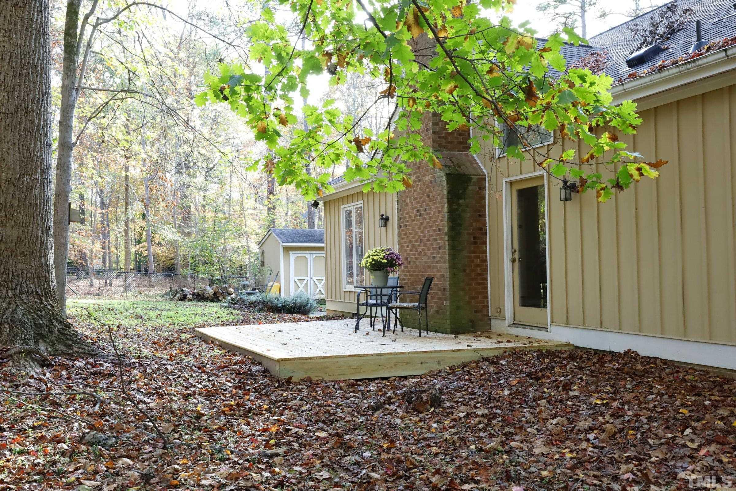 10904 Brass Kettle Road Raleigh, NC 27614 - Photo 35 of 41 a view of a house with a yard