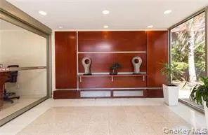 a room with gym equipment and a large window