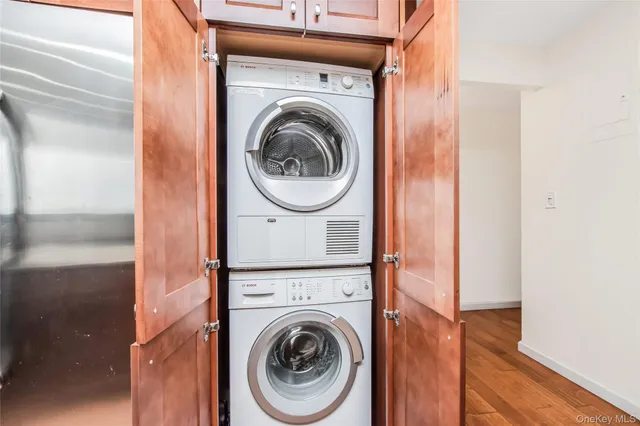 a close view of a utility room with dryer and washer