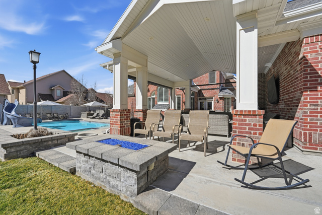 714 Draper Heights Way Draper, UT 84020 - Photo 78 of 88 View of patio / terrace with an outdoor fire pit