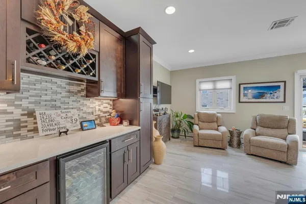 a hallway with a view of living room