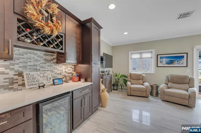 a hallway with a view of living room