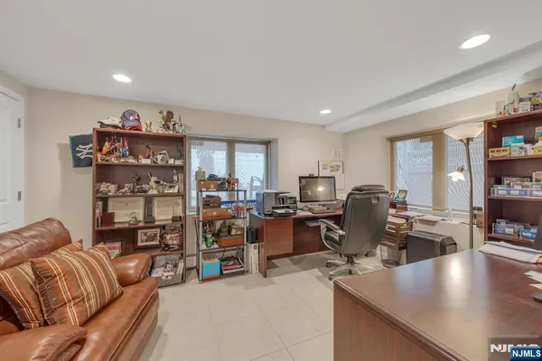 a view of a chairs and table in a patio