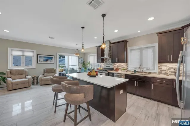 a kitchen with counter space appliances and a kitchen view