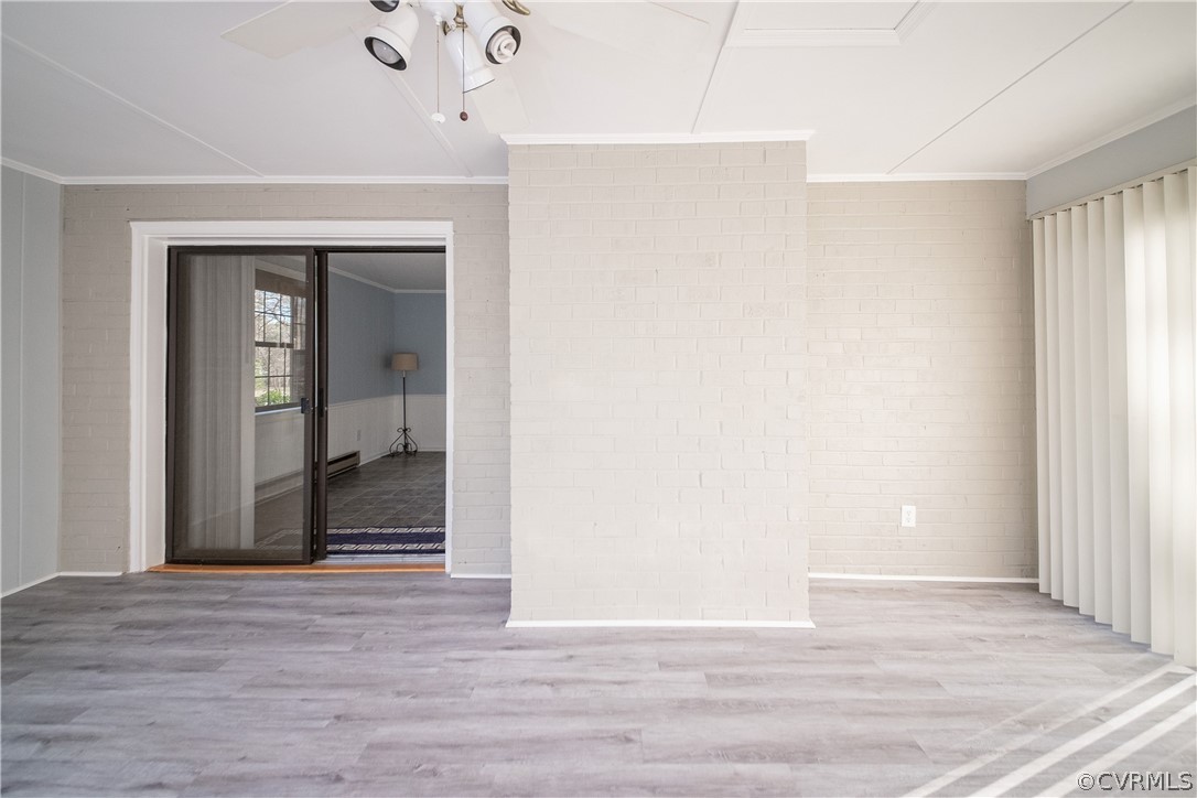 1540 Wagonwheel Road Midlothian, VA 23113 - Photo 39 of 49 Brand new vinyl plank flooring in the florida room