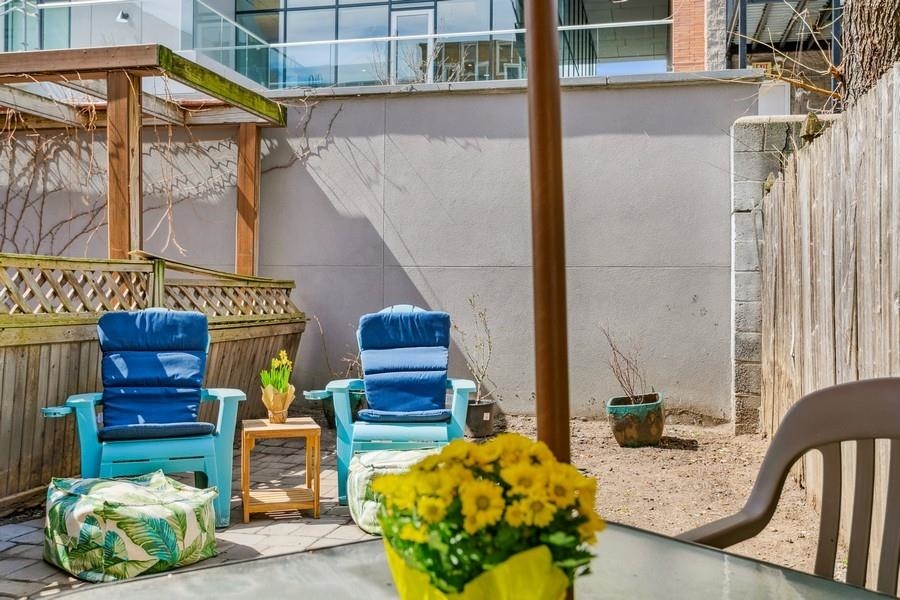 412 Monroe Street, Unit 2 Hoboken, NJ 07030 - Photo 13 of 16 a backyard of a house with seating space