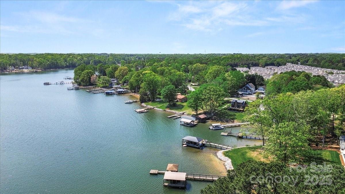 13 Normandy Road Denver, NC 28037 - Photo 11 of 14 an aerial view of a town with residential houses and lake view