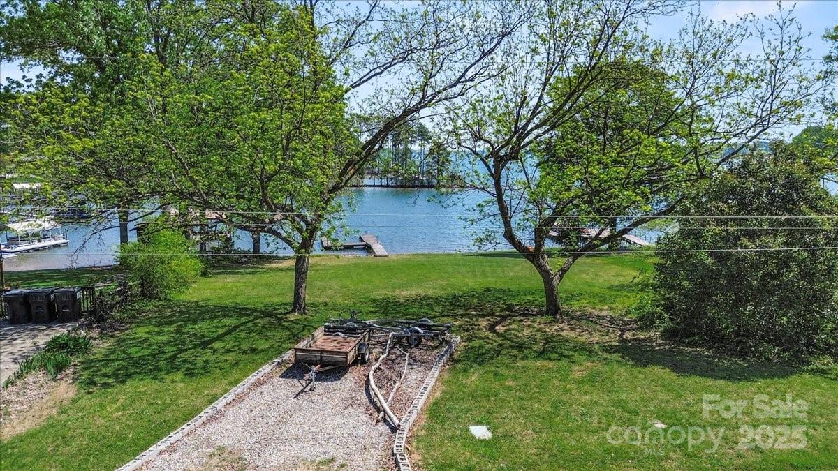 13 Normandy Road Denver, NC 28037 - Photo 2 of 14 a view of a park with large trees
