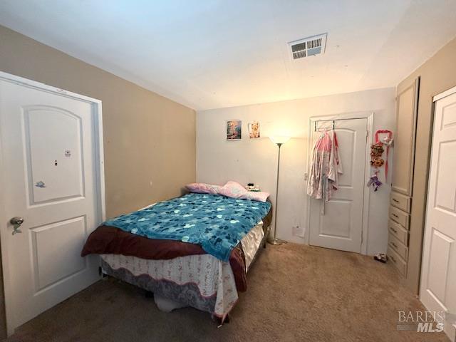 3110 Redemeyer Road Ukiah, CA 95482 - Photo 12 of 31 a bedroom with a bed and a cabinet