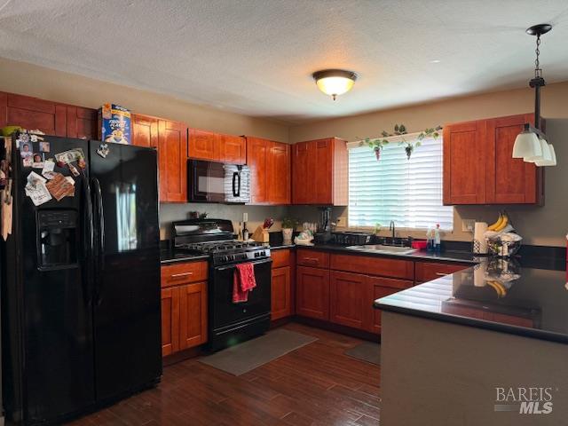 3110 Redemeyer Road Ukiah, CA 95482 - Photo 4 of 31 a kitchen with stainless steel appliances granite countertop a sink stove and refrigerator