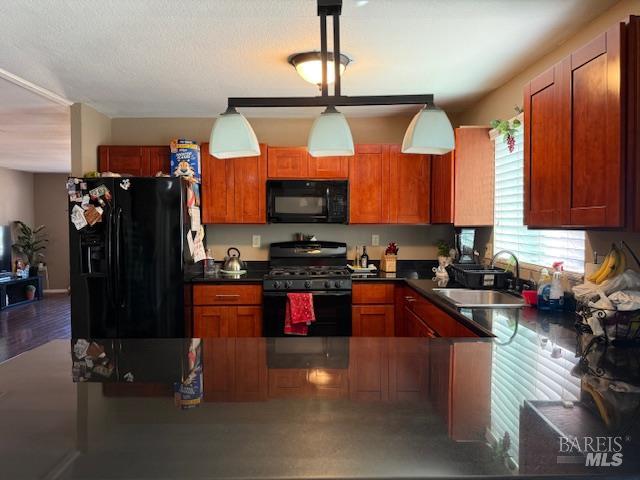 3110 Redemeyer Road Ukiah, CA 95482 - Photo 5 of 31 a kitchen with stainless steel appliances granite countertop a refrigerator a stove and a sink