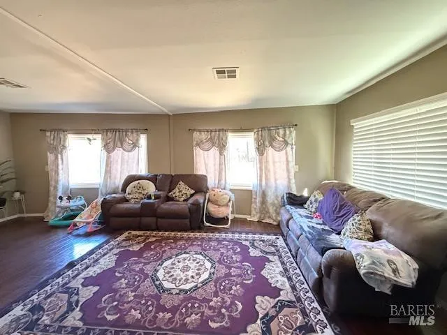 a living room with furniture and a couch