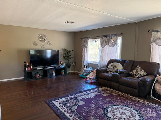 3110 Redemeyer Road Ukiah, CA 95482 - Photo 10 of 31 a living room with furniture and a flat screen tv