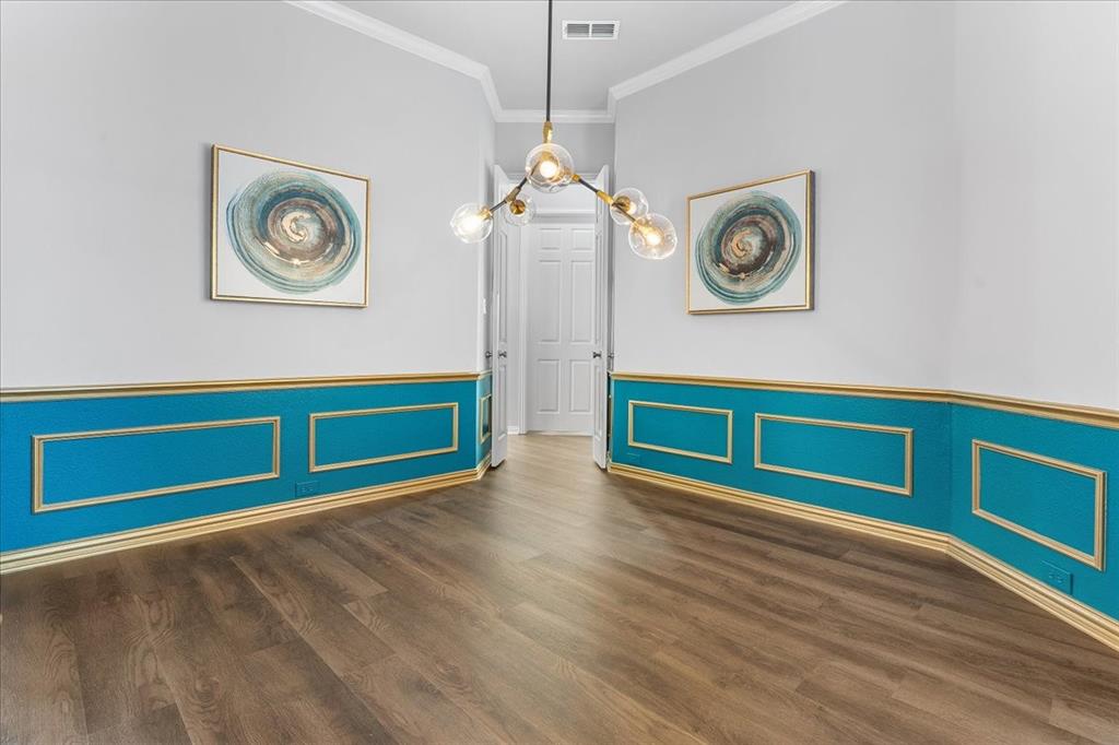 8306 Sawgrass Lane Rowlett, TX 75089 - Photo 15 of 35 a view of a room with wooden floor and window