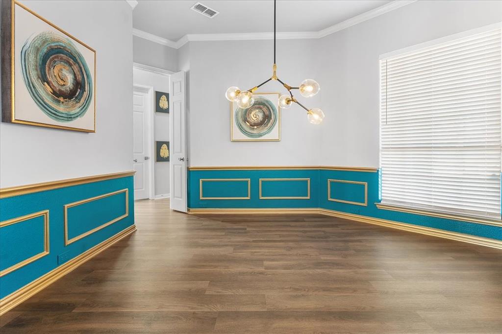8306 Sawgrass Lane Rowlett, TX 75089 - Photo 16 of 35 a view of a room with wooden floor and window