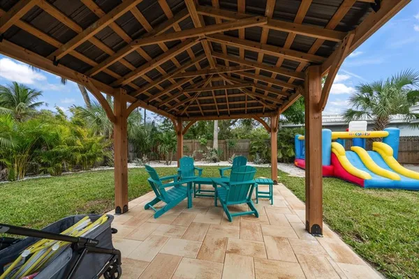 a view of a swimming pool with a patio