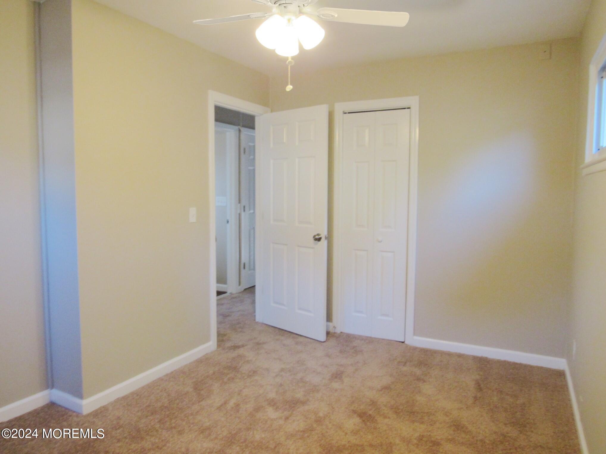 115 Solar Drive Brick, NJ 08724 - Photo 13 of 15 a view of an empty room