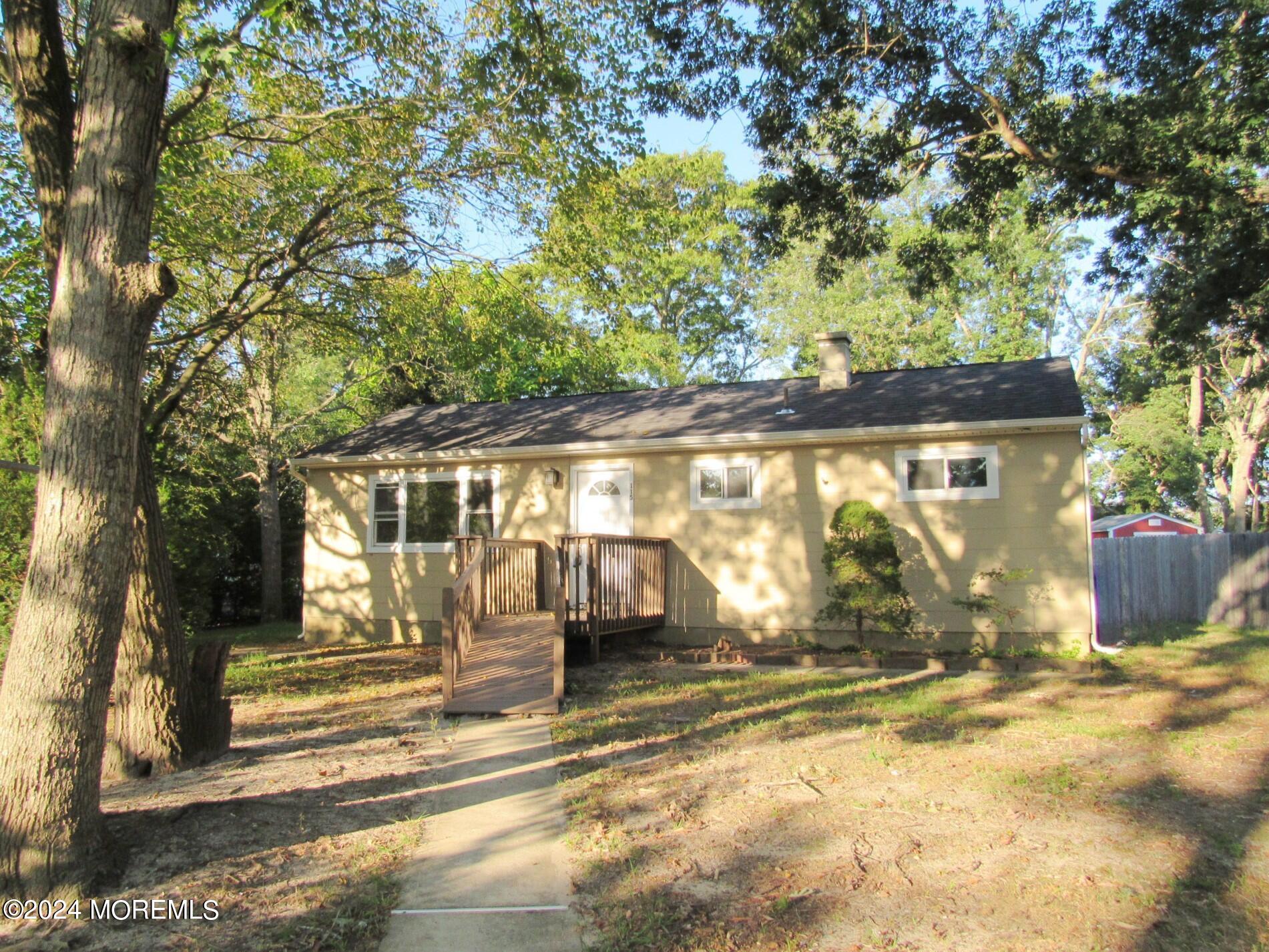 115 Solar Drive Brick, NJ 08724 - Photo 2 of 15 a view of a house with a outdoor space