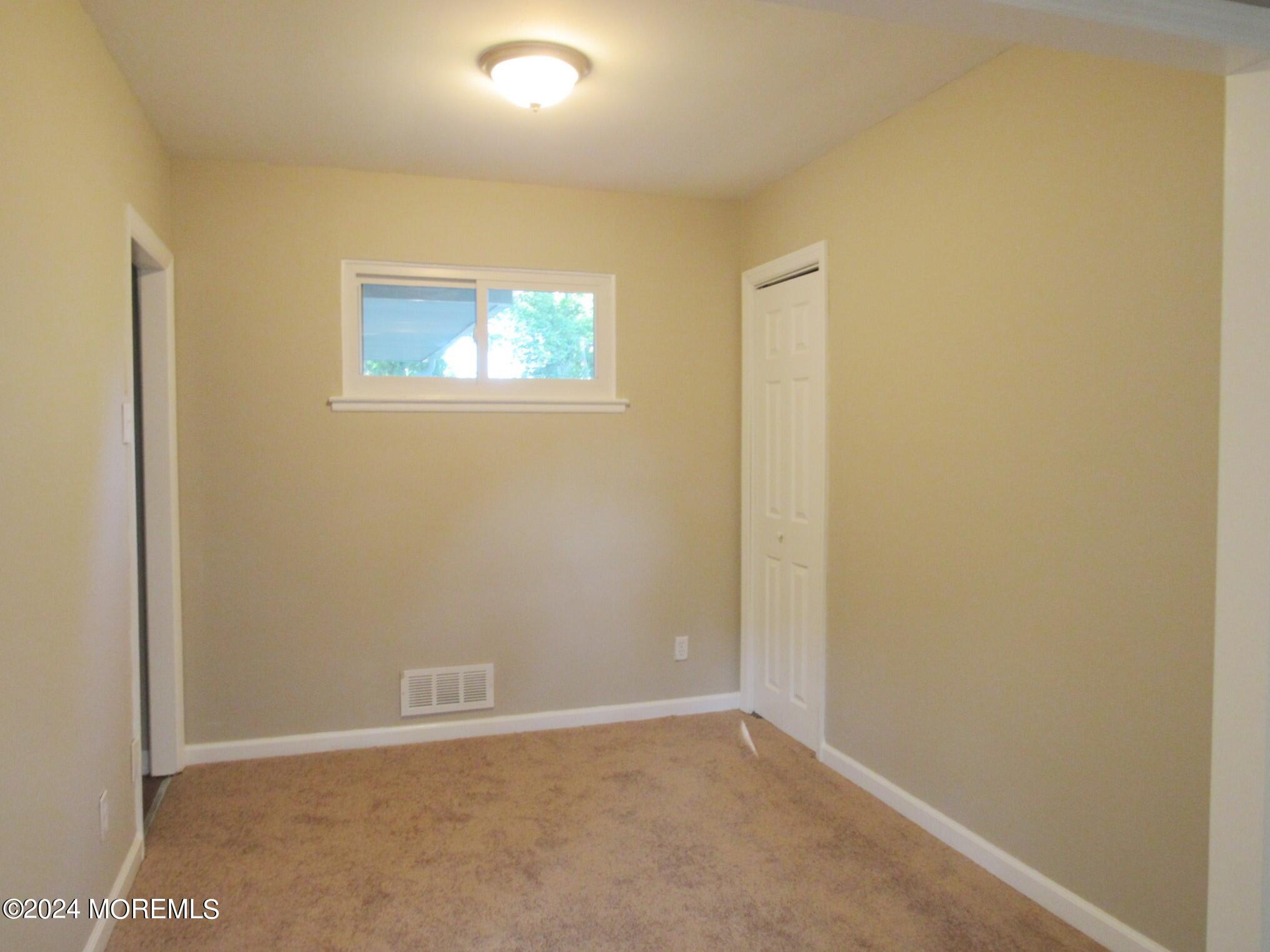 115 Solar Drive Brick, NJ 08724 - Photo 10 of 15 a view of an empty room