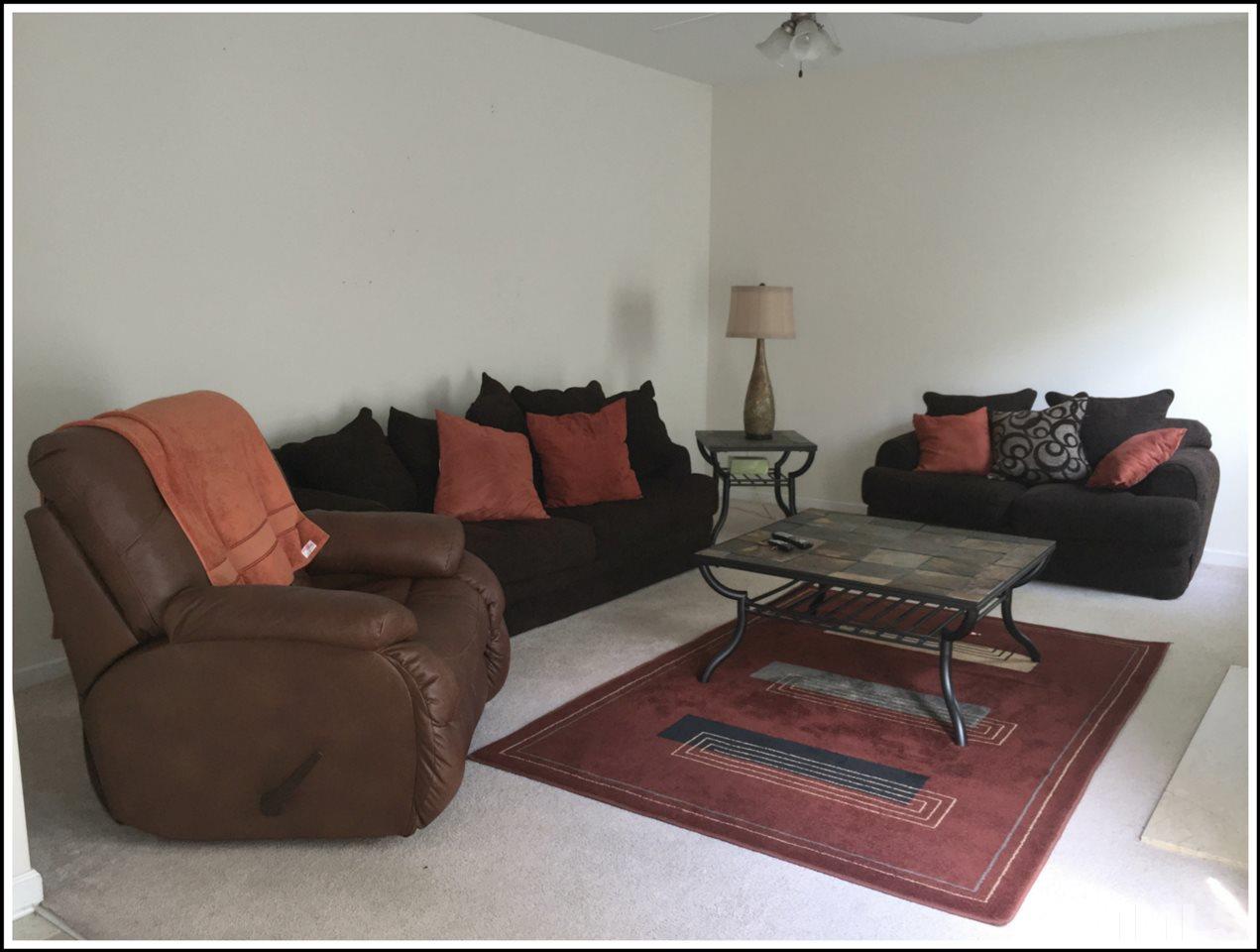 161 Longbay Street Garner, NC 27529 - Photo 2 of 9 There is a fireplace on the wall to the right.