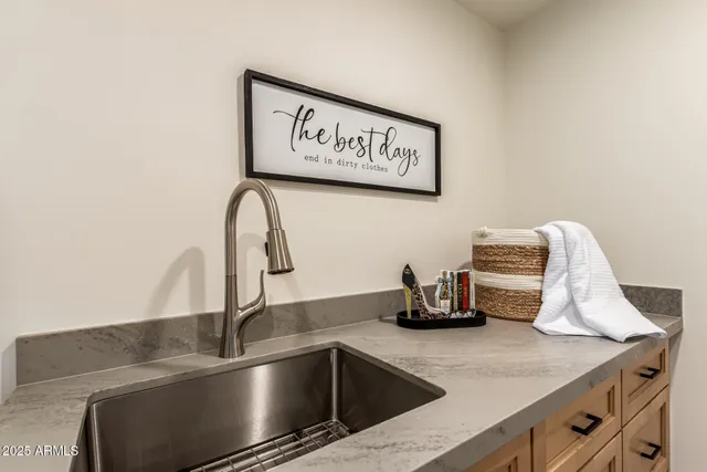 a kitchen with a washer and dryer