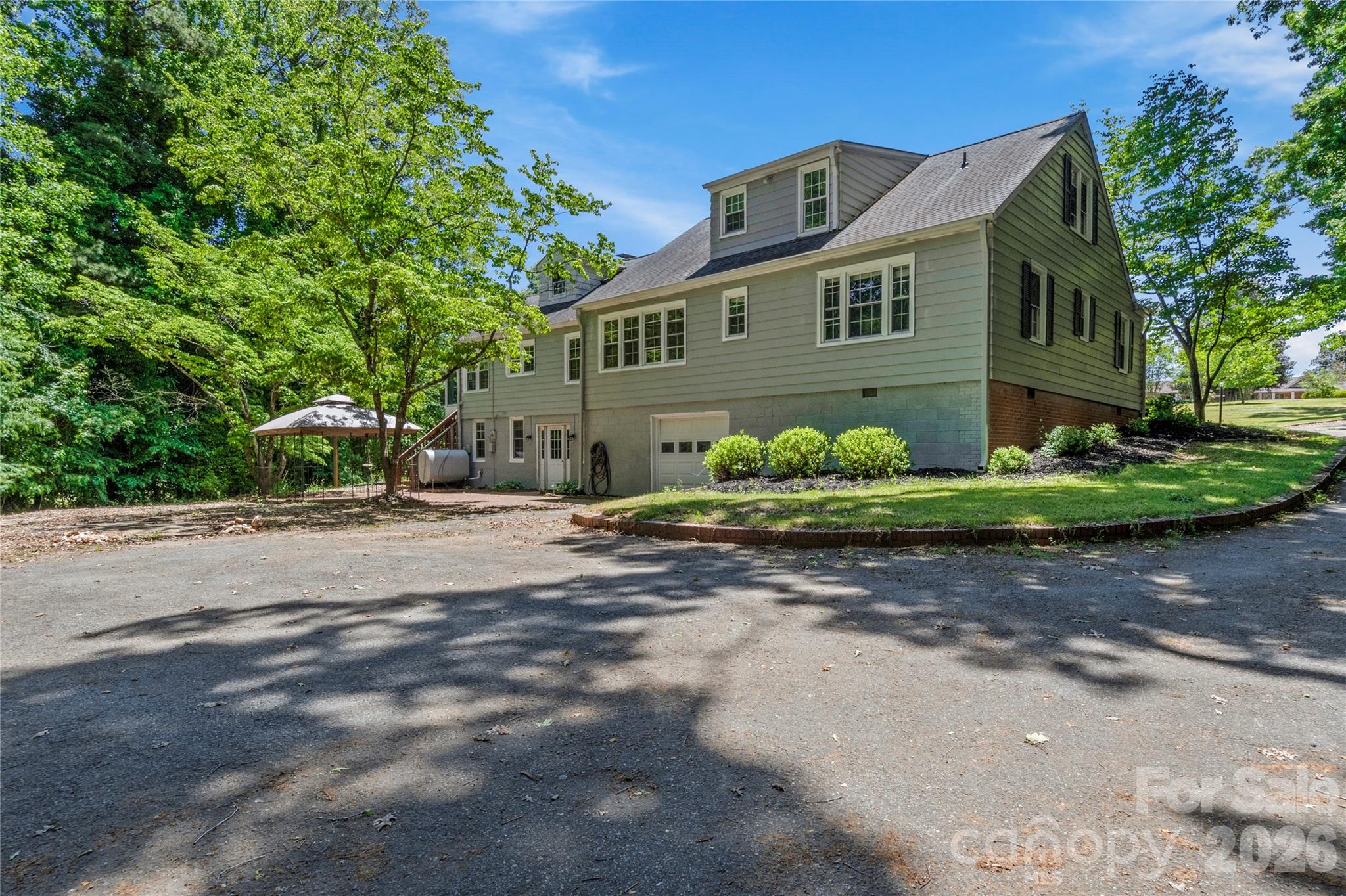 951 Dodson Mill Road Pilot Mountain, NC 27041 - Photo 38 of 48 a front view of a house with a yard