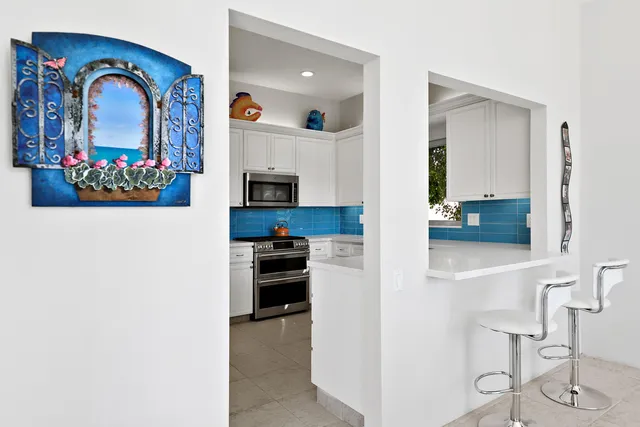 a view of living room with furniture and flat screen tv