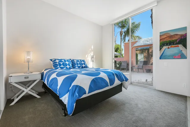 a livingroom with furniture and natural light