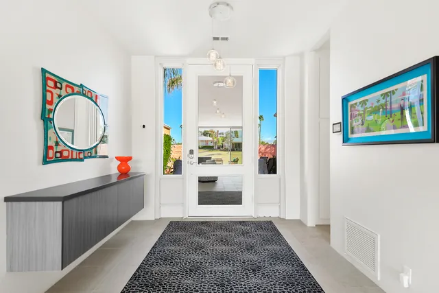 a view of living room and front door