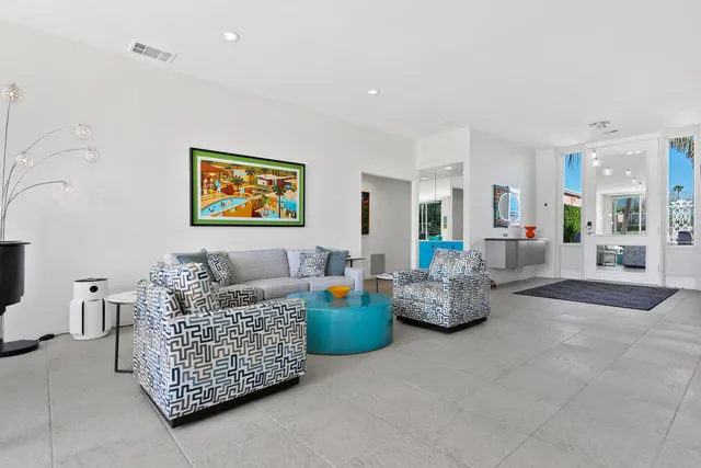 a living room with furniture and a couch