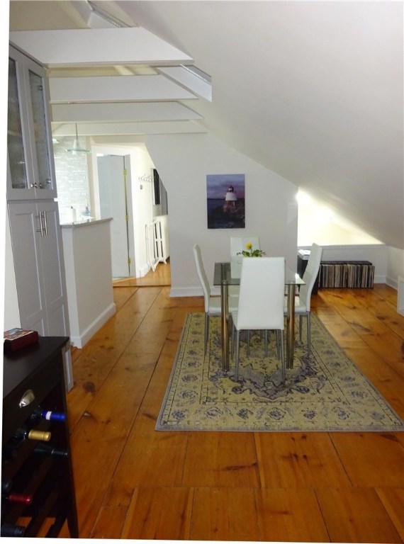 42 Kay Street, Unit 5 Newport, RI 02840 - Photo 12 of 34 Living room opens into the dining area.