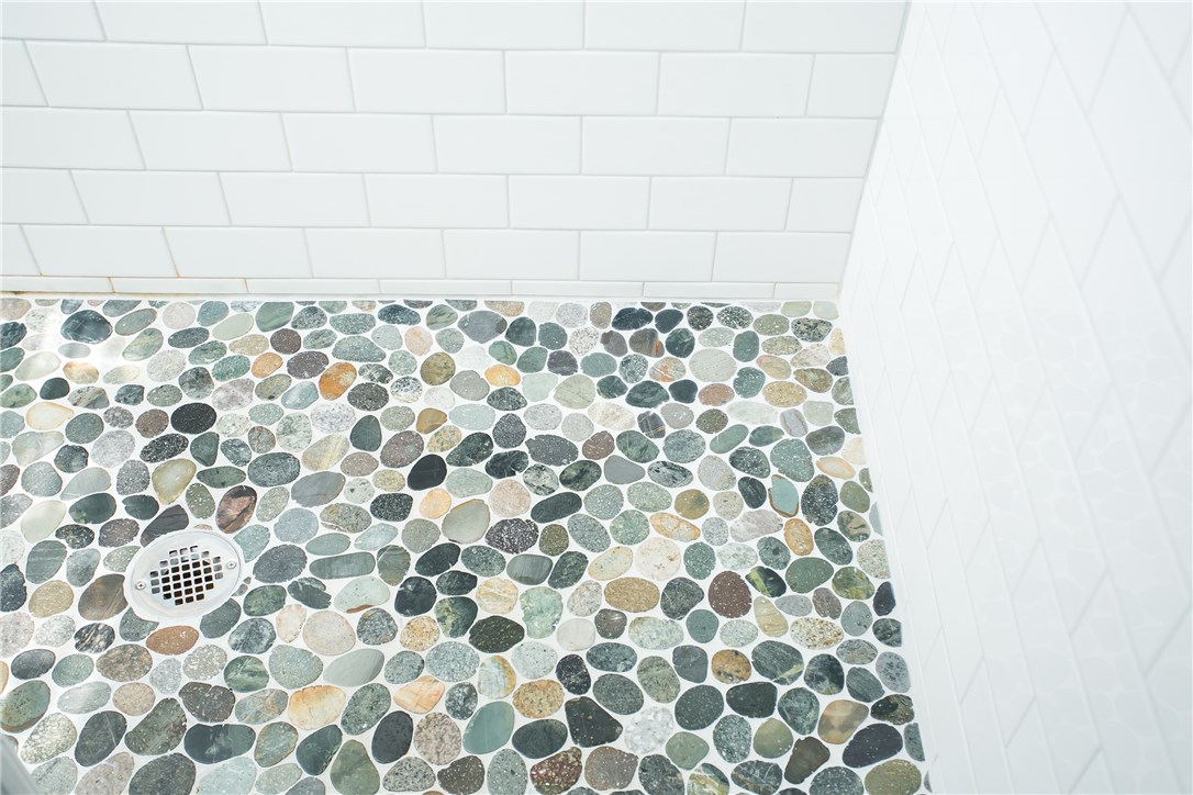 42 Kay Street, Unit 5 Newport, RI 02840 - Photo 23 of 34 Pebble tile shower floor.