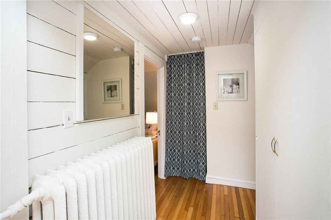 42 Kay Street, Unit 5 Newport, RI 02840 - Photo 24 of 34 Hallway to the bedrooms. Closet to the right, laundry straight ahead, master to the left, bedroom 2 to the right.