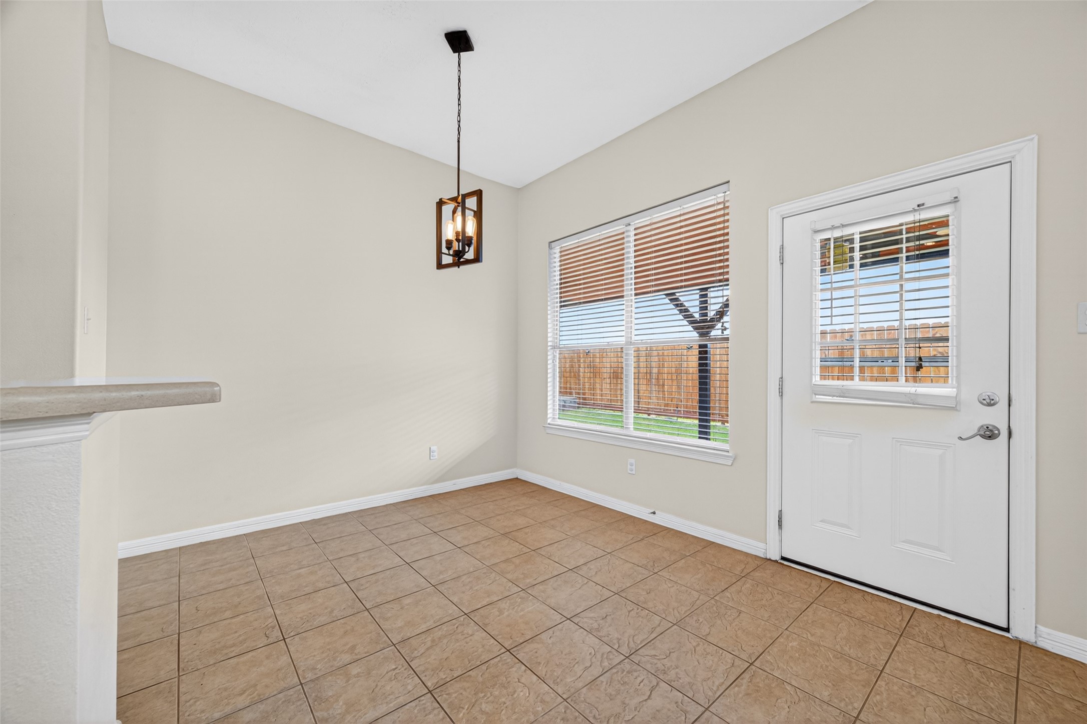 23914 Glengate Drive Spring, TX 77373 - Photo 14 of 49 a view of an empty room with a window