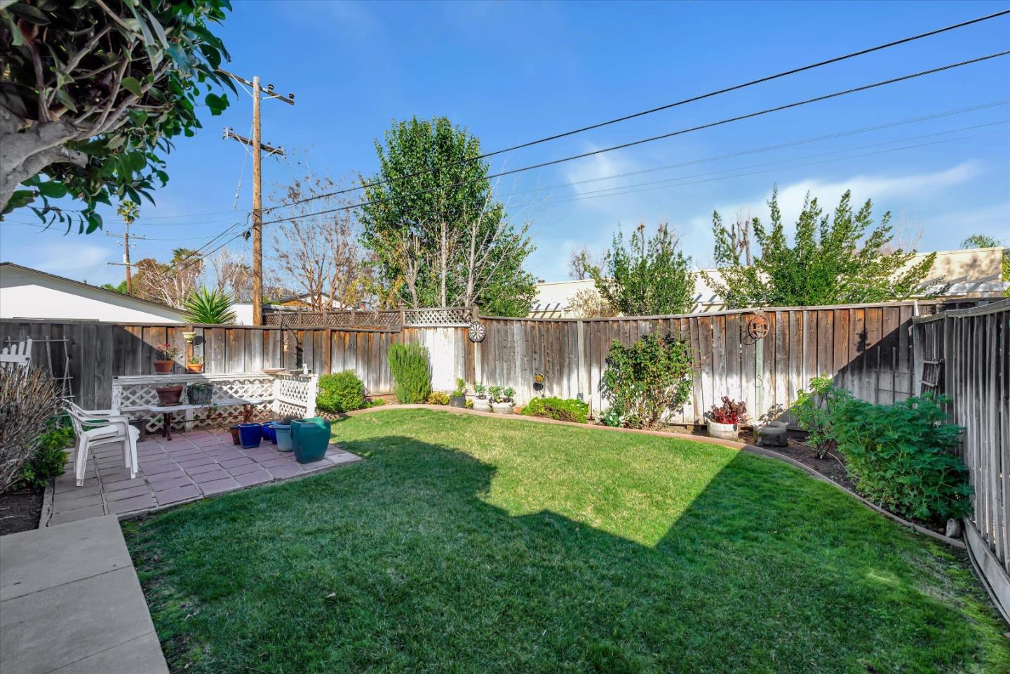 1944 Bird Avenue San Jose, CA 95125 - Photo 9 of 15 a view of a chair and table in backyard of the house