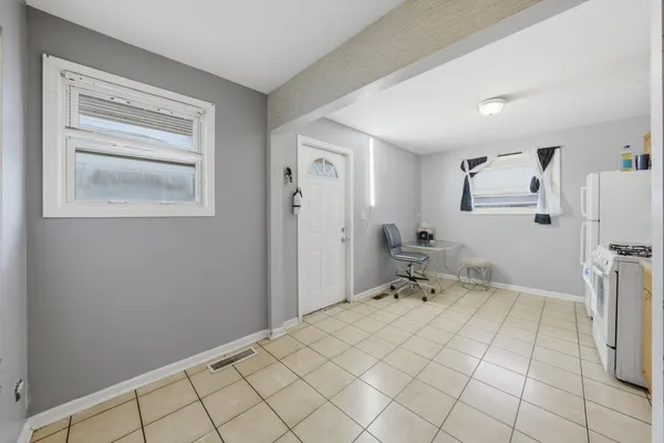 a room that has a bed and a table in it