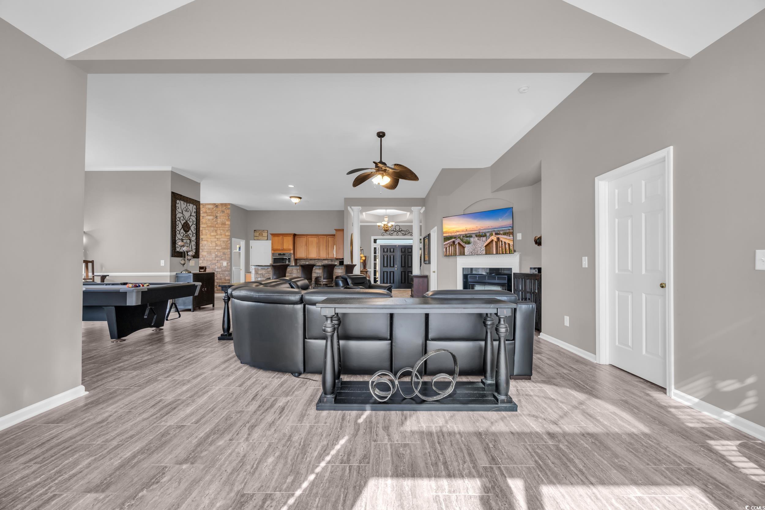 2385 Windmill Way Myrtle Beach, SC 29579 - Photo 23 of 39 Living room with vaulted ceiling, ceiling fan, and
