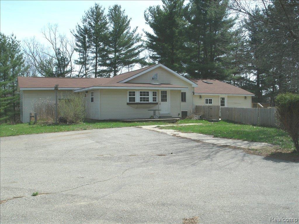 8433 Washburn Road Columbiaville, MI 48421 - Photo 1 of 14 Washburn rear
