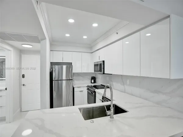 a view of swimming pool with outdoor seating