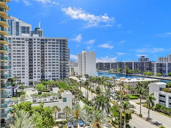 a view of a city with tall buildings